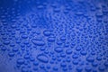 Closeup waterdrops on blue ceramic coated paint surface Royalty Free Stock Photo