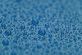 Closeup waterdrops on blue ceramic coated paint surface Royalty Free Stock Photo