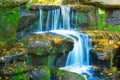 closeup waterfall rushing over a stones
