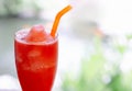 Closeup watermelon smoothie on wood table, selective focus