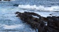 Wave hitting a rock in the ocean making a big splash Royalty Free Stock Photo