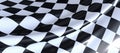 Closeup of a wavy checkered flag under the lights - perfect for wallpapers and backgrounds Royalty Free Stock Photo