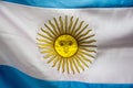 Closeup of the wavy flag of Argentina under the lights - patriotic concept