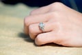 Closeup the wedding beautiful diamond ring on women ring finger Royalty Free Stock Photo