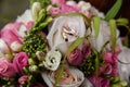 Closeup of wedding rings on a beautiful bridal bouquet Royalty Free Stock Photo