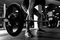 Closeup of weightlift workout at the gym with barbell. Royalty Free Stock Photo