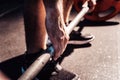 Closeup of weightlifter clapping hands before barbell workout at the gym Royalty Free Stock Photo