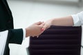 Closeup .welcoming handshake of a businessman and business woman Royalty Free Stock Photo