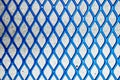 Closeup of welded chain link blue metal fence