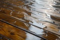 closeup of wet hardwood floor warping and buckling