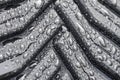 Closeup of wet vehicle tire tread. Rubber car tyre Royalty Free Stock Photo