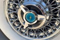 Closeup wheel of Ford Thunderbird classic retro car.