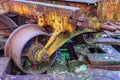 Closeup of a wheel on old train bogie, support and central axle