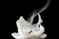 Closeup of white blown out and smoking candle Royalty Free Stock Photo