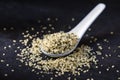 Hulled hemp seeds on a dark gray surface Royalty Free Stock Photo