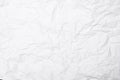 Closeup white crumpled paper texture background White wrinkled paper texture background.