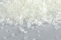 Closeup of white granulated sugar on Isolated White Background. Royalty Free Stock Photo