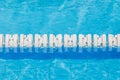 Closeup the white marked lanes in swimming pool for competitions Royalty Free Stock Photo