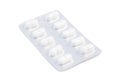 Closeup of white medicine pills in an unused blister pack Royalty Free Stock Photo
