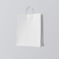 Closeup White Paper Bag Isolated Center Gray Empty Background.Mockup Highly Detailed Texture Materials.Space for