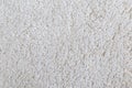 Closeup of white shaggy carpet texture