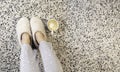 Closeup of white wool slippers and coffee everyday lifestyle scene