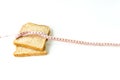 Closeup whole wheat bread with measuring tape