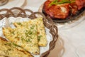 Closeup of wicker basket with sliced garlic bread on the table of a hindu restaurant Royalty Free Stock Photo