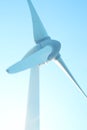 Closeup wind turbines, wind power blue sky background, design architecture, Mobile phone wallpaper, vertical