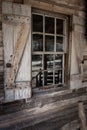 Closeup of windowpanes and shutters from civil war era log cabin in Callaway gardens in Georgia