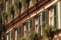 Closeup of windows of a residential building in an Old town of Nuremberg, Germany Royalty Free Stock Photo