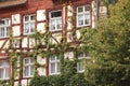 Closeup of windows of a residential building in an Old town of Nuremberg, Germany Royalty Free Stock Photo