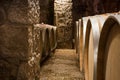 Closeup of Wine Barrels in a Wine Cellar