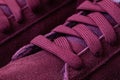 Closeup of wine color sneakers