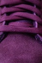 Closeup of wine color sneakers