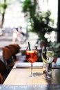 Closeup of wine and Spritz on a table
