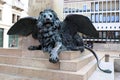 Closeup of a winged lion at Campo Manin in Venice,