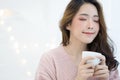 Closeup winter portrait of young Asian beautiful woman wearing k