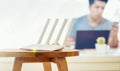 Closeup of a wireless router and a man using smartphone on living room at home ofiice, equipment for  working from home, while in Royalty Free Stock Photo