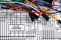 Closeup of wires on circuit scheme - concept of learning, training and development of electric circuits