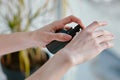 Closeup woman applying hand lotion from natural SPA cosmetics Royalty Free Stock Photo