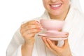 Closeup on woman in bathrobe with cup of tea Royalty Free Stock Photo