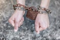 Closeup woman with chained hands and padlock Royalty Free Stock Photo