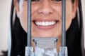 Closeup, woman or digital for scan of mouth, xray or examination at dentist. Female, patient and smile for dental