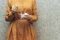 Closeup woman eating algerian homemade vanilla caramel custard desert, flan