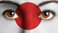 Closeup woman eyes japanese flag painted face. Royalty Free Stock Photo
