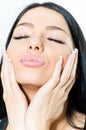 Closeup on woman face and sweet candy sugar lips kiss Royalty Free Stock Photo