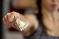 Closeup of woman hand giving money Royalty Free Stock Photo