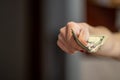 Closeup of woman hand giving money Royalty Free Stock Photo