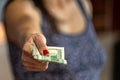 Closeup of woman hand giving money Royalty Free Stock Photo